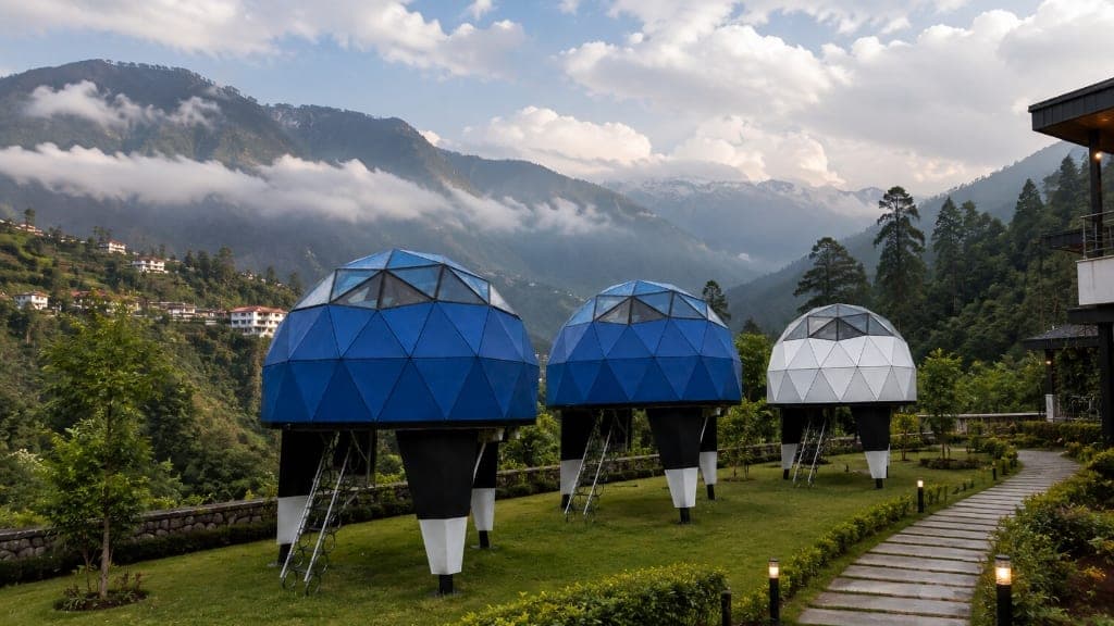 NIVA D1 luxury elevated dome cabin perched on 3 support pillars by river valley